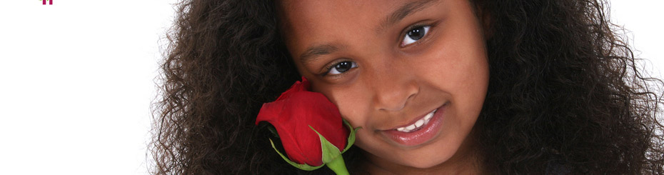 child with red rose